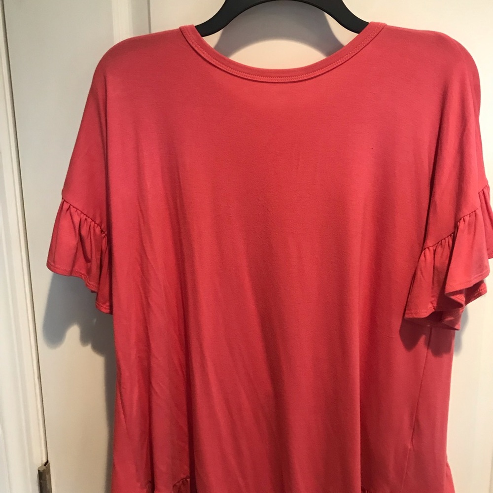 Short sleeve coral top with ruffle detail